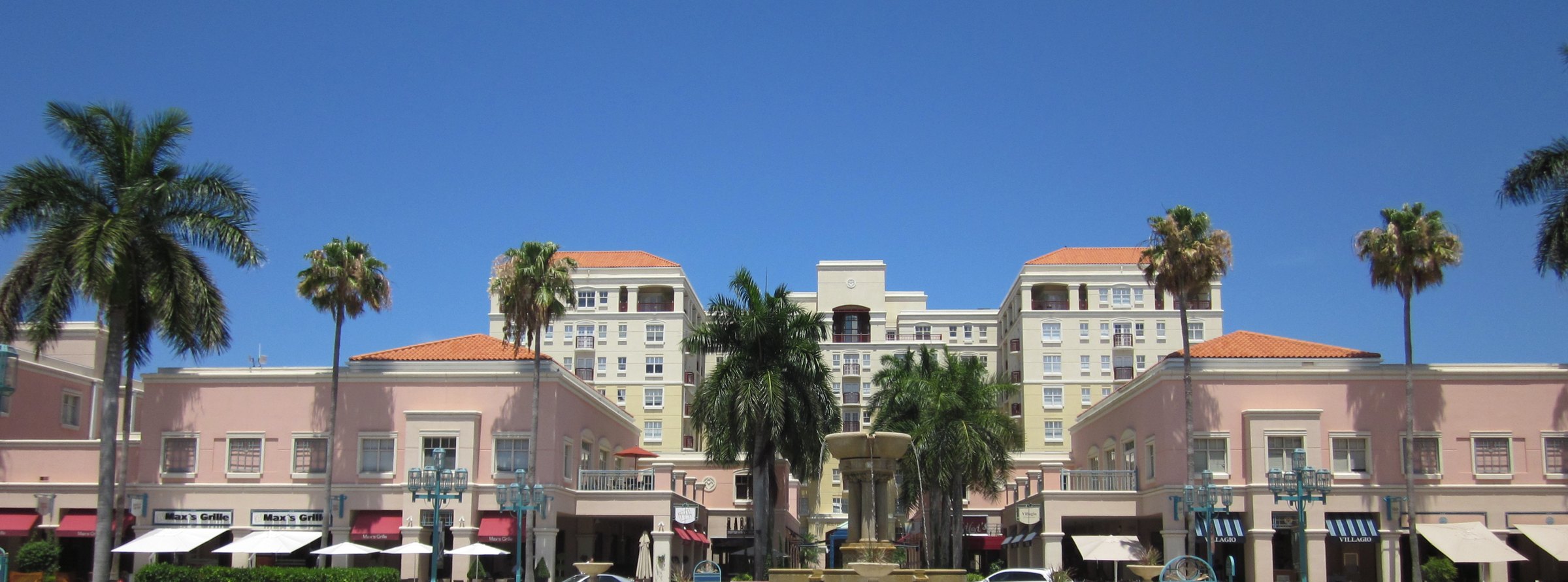 Mizner Park plaza, fountain, and Mediterranean storefronts in Boca Raton